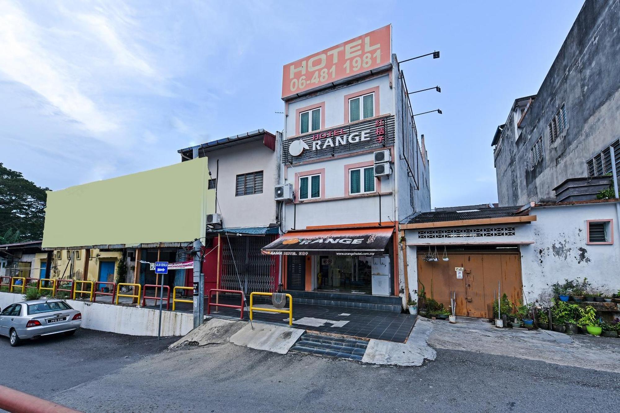Super Oyo 992 Orange Hotel Куала-Пилах Экстерьер фото
